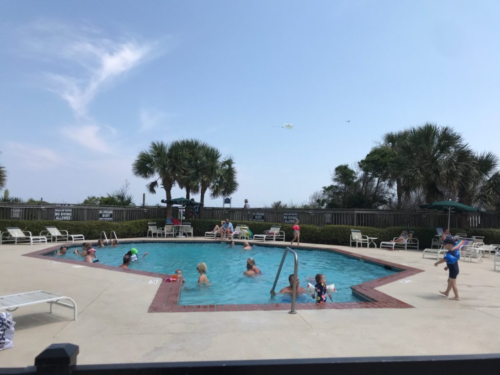 Families Enjoying The Oceanfront South Hampton Pool